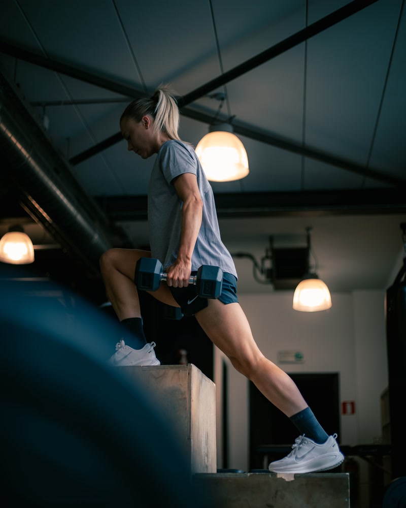A patient steps onto the box during an exercise.