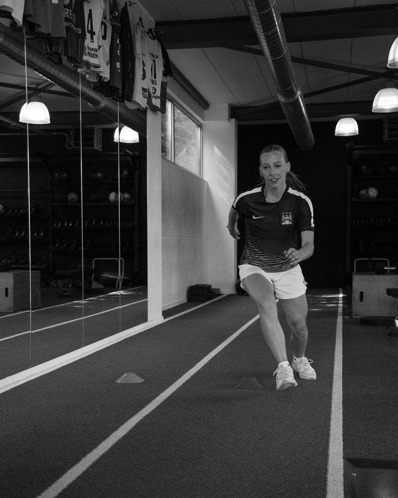 A patient runs freely again on the indoor track.